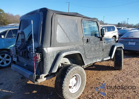 2003 Jeep Wrangler Sahara z USA, uszkodzony, nr VIN 1J4FA59S23P342855